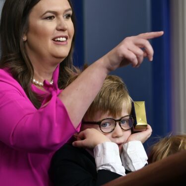 Sarah Sanders, Huck Sanders