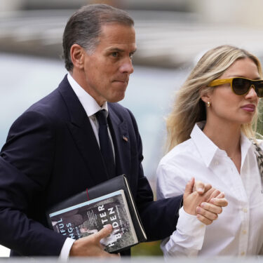 Hunter Biden, left, arrives to federal court with his wife, Melissa Cohen Biden, Thursday, June 6, 2024, in Wilmington, Del. (AP Photo/Matt Slocum)