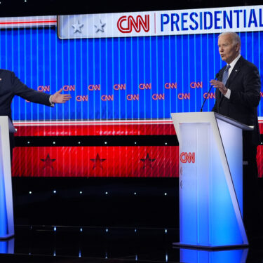 Republican presidential candidate former President Donald Trump, left, and President Joe Biden, right, speak simultaneously during a presidential debate hosted by CNN, Thursday, June 27, 2024, in Atlanta. (AP Photo/Gerald Herbert)