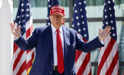 FILE - Republican presidential candidate former President Donald Trump enters at a campaign event, June 18, 2024, in Racine, Wis. Former President Donald Trump's sentencing in his hush money case has been postponed until Sept. 18. (AP Photo/Jeffrey Phelps, File)